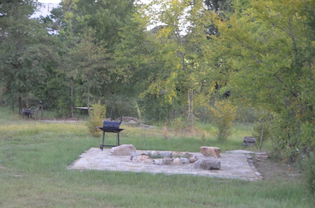 Lake Fork Farm Our 400 SF stone fire pit and charcoal barbeque grill located right off your balcony - we provide all the firewood you need.